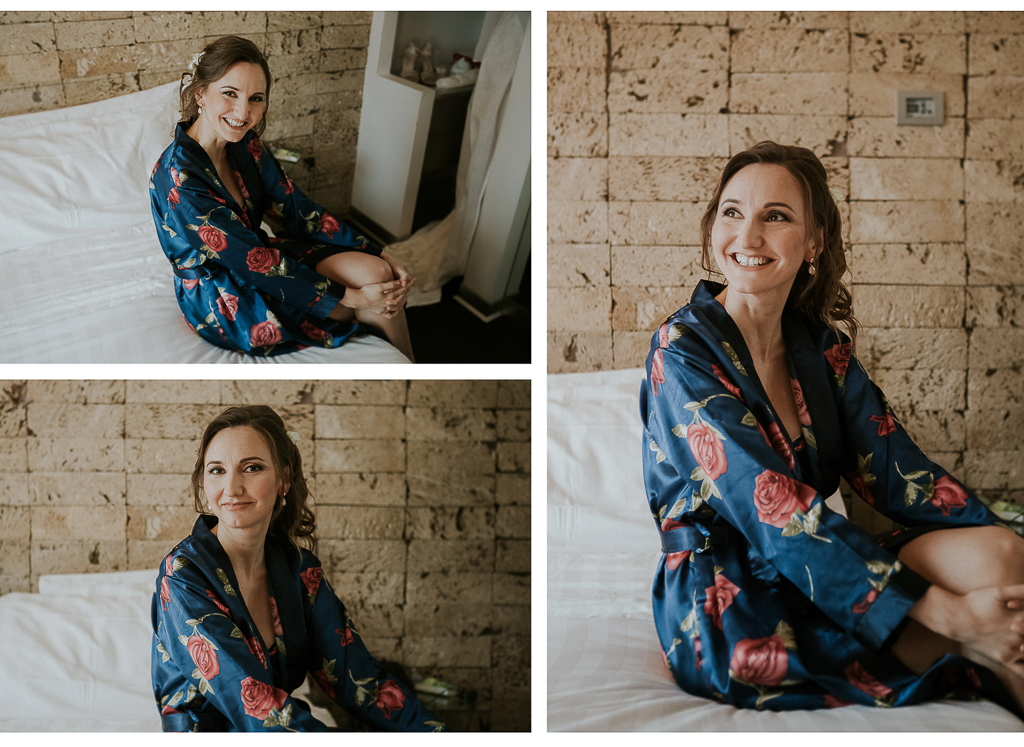 la sposa è sorridente mentre si prepara