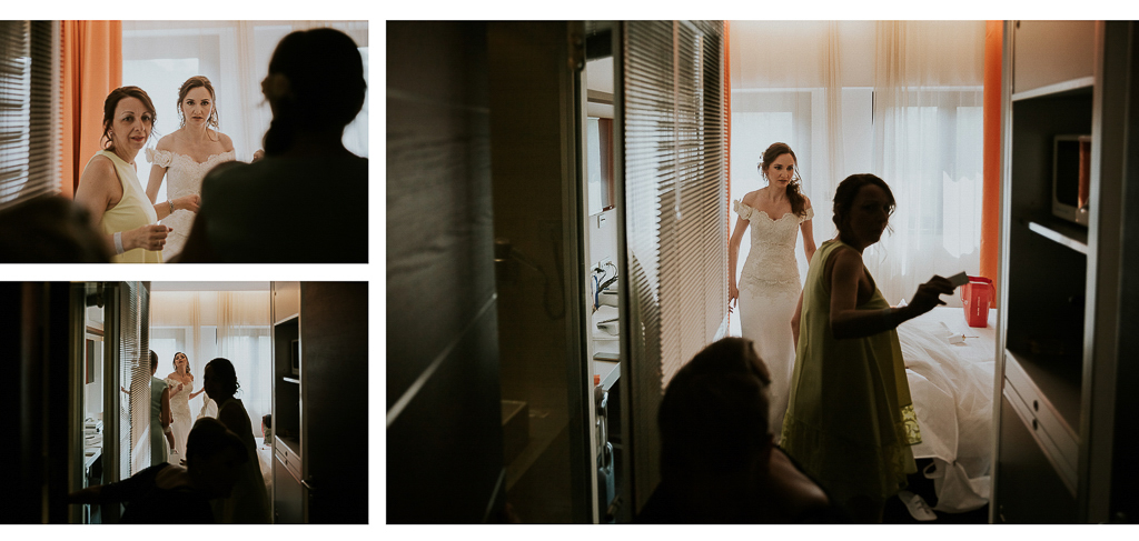 la sposa si prepara mettendo il vestito bianco